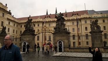 Scary statues at gate + guards